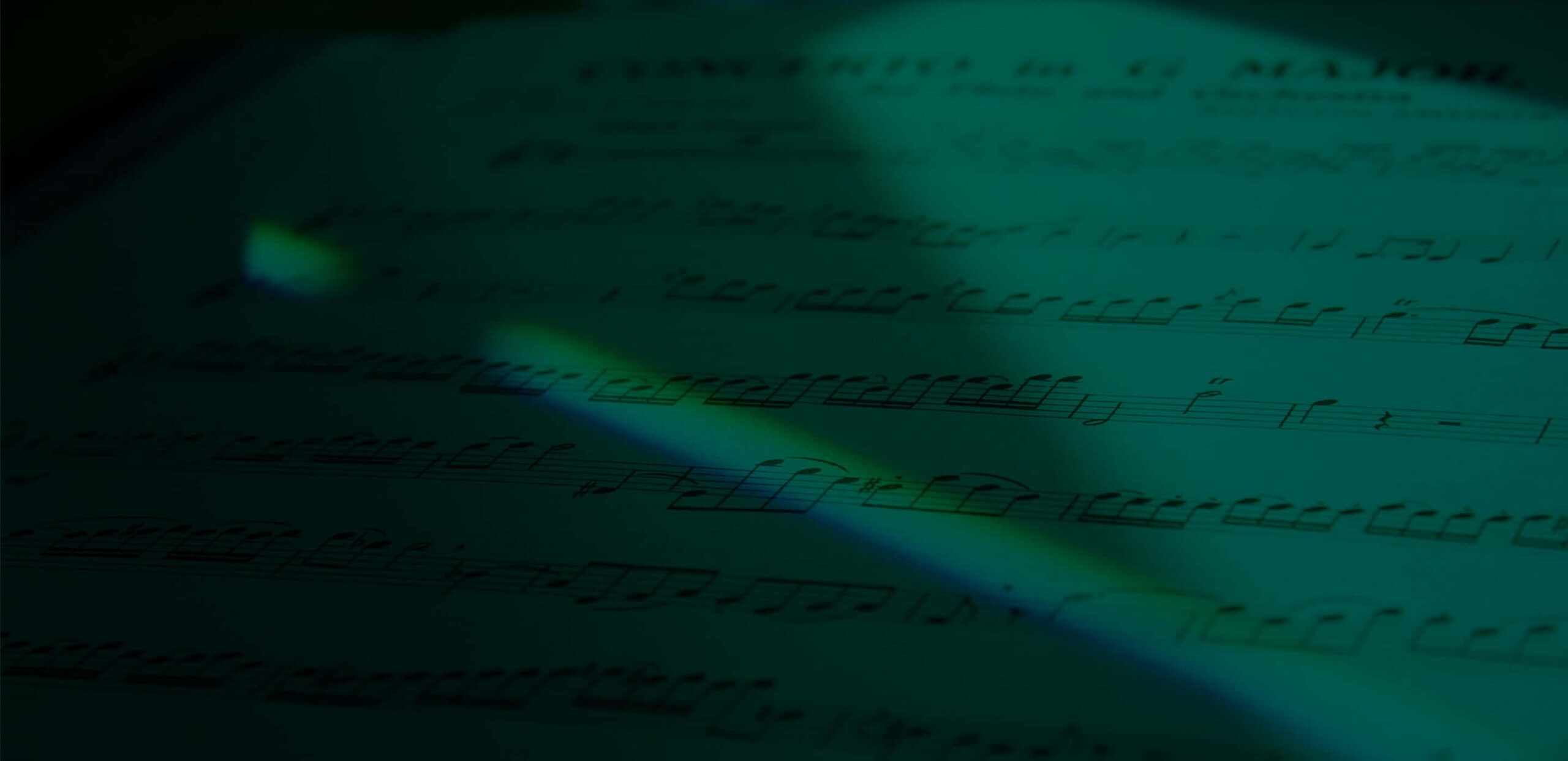 Closeup of sheet music with a green overlay